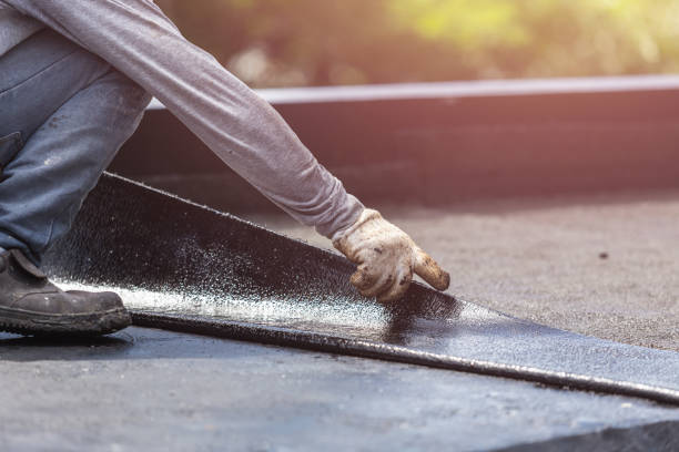Professional Basement Waterproofing technician working in Wellington, KS